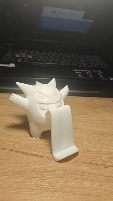 Фигурка и подставка для телефона