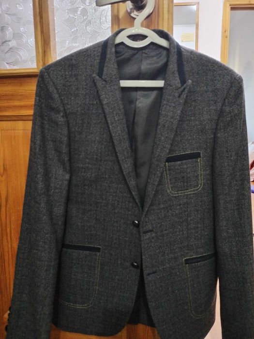 Пиджак мужской 2 марта кийилган