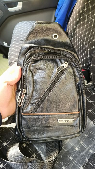Продам барсетка новый кожа и трапичные