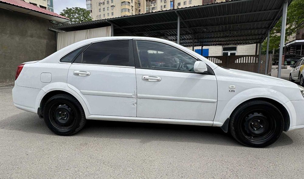 Lacetti 1.8 Avtomat, Full (suyegi butun, kraska, chaqa-chuqasi bor)