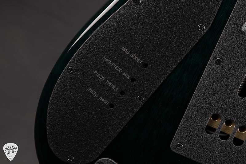 Гитара Ernie Ball Music Man John Petrucci JP15-7 Green Tiger Eye Quilt