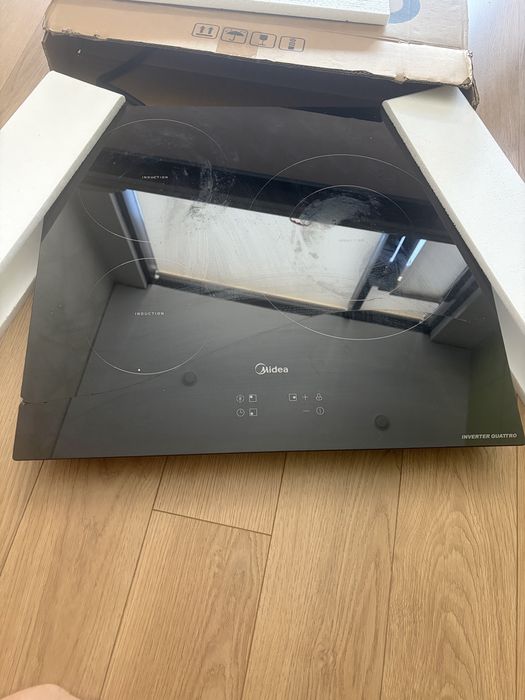Продам индукционную плиту Midea