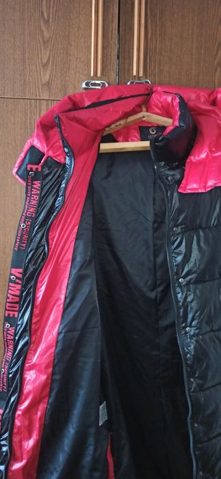 Пуховик             .