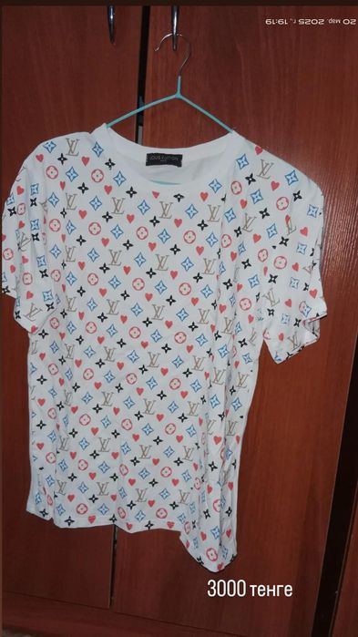 Футболки женские