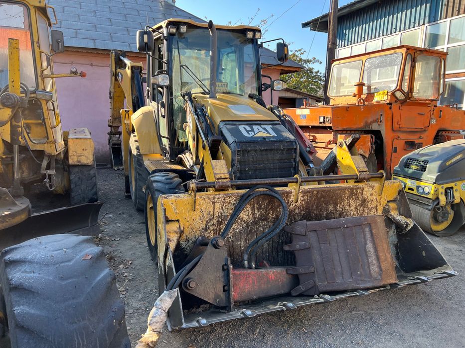 Inchirieri utilaje, buldoexcavator cu picon, cilindru compactor,