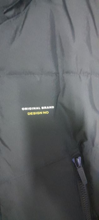 Пуховик удленённый,новый.