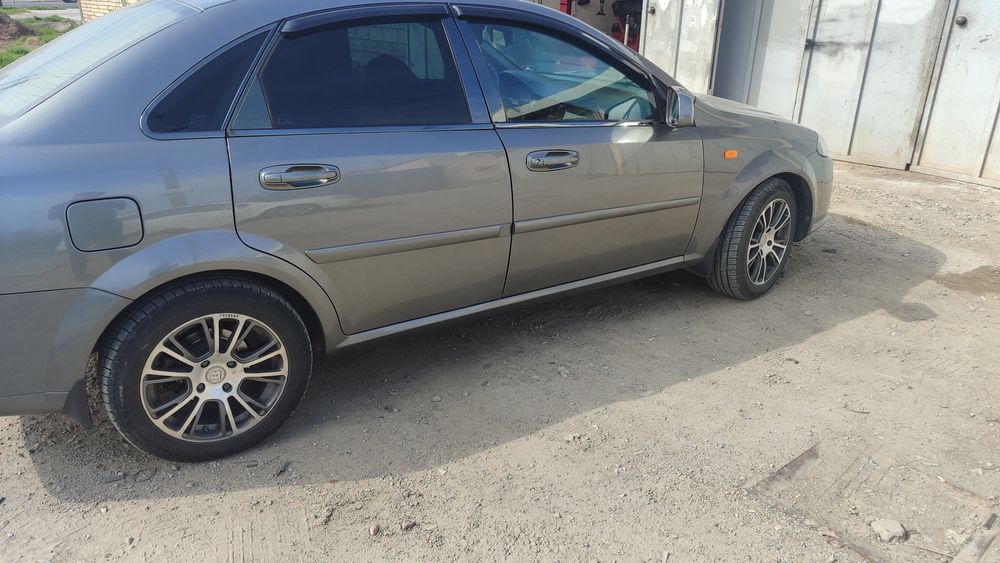 Диск с колесом для автомобиля