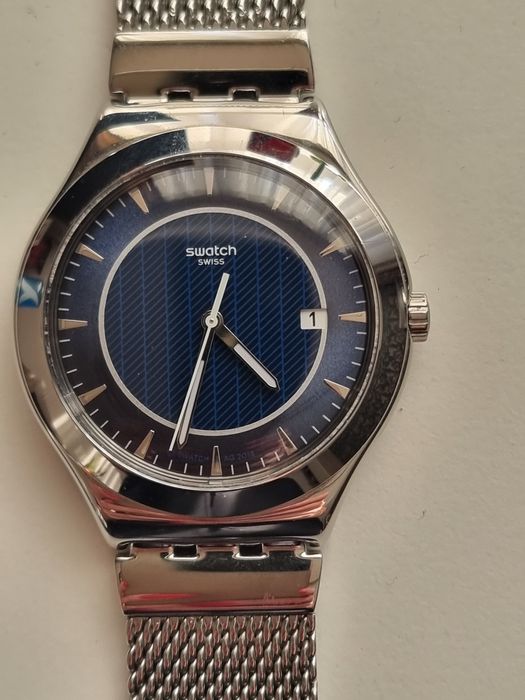 Часовник Swatch blue icone