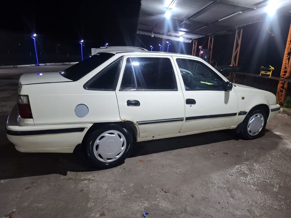 Nexia 1 supper kanditsioner yili 2003 suyagi butun benzin mator karopk