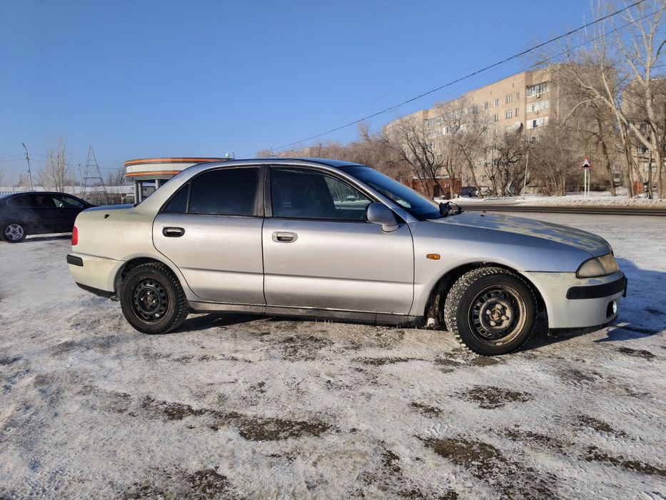 Автомобиль Mitsubishi charisma Митсубиси АКПП автомат
