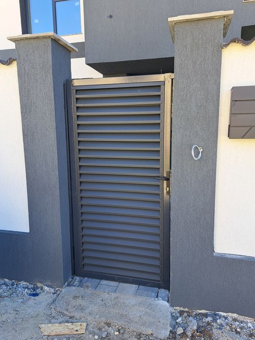 Executăm porți la comanda clientului din lamele executăm porți din șipcă metalică executăm porți din tablă decupată executăm porți din tablă cutată ex