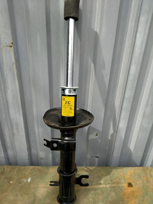 Стойка передняя nexia aveo