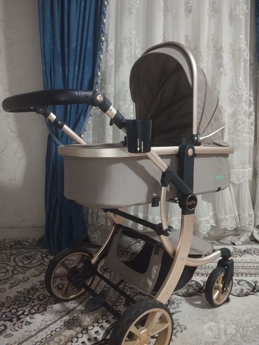 Bolalar kolyaskasi kidilo