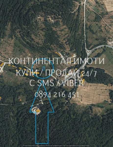 кодл 63093. Два парцела по 400м2 с лице на асфалтов път