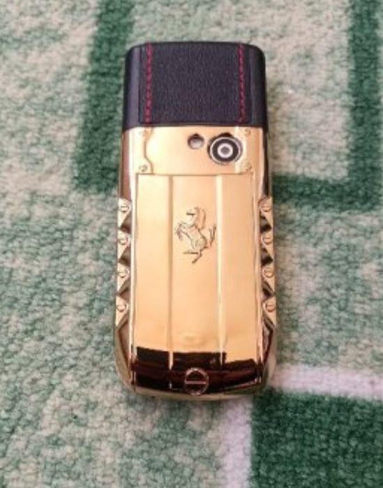 Мобилен телефон марка SERVO с две СИМ карти + кутия + зарядно - работи