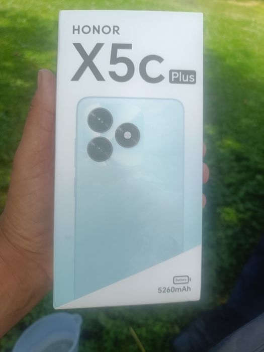 Vand telefon  Honor