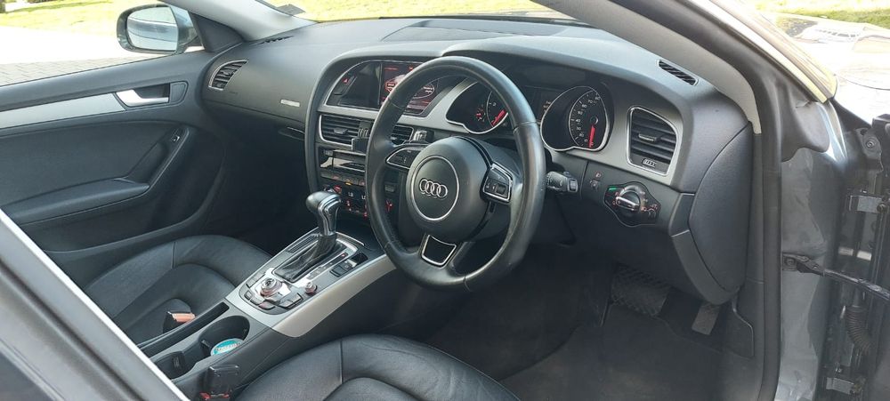 Audi A5 din 2014 2.0 TDI Automată 8+1 Volan pe dreapta Anglia