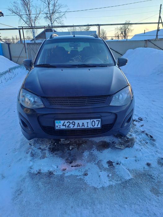 Продам калина2 универсал + летняя резина с титанками