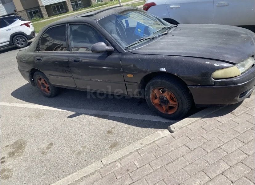 Продам мазду кронос
