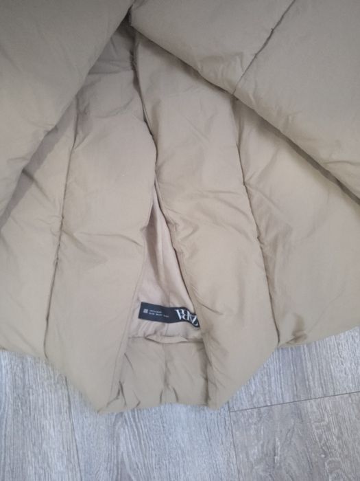 Пуховики женские