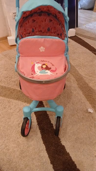 Игрушечная детская коляска