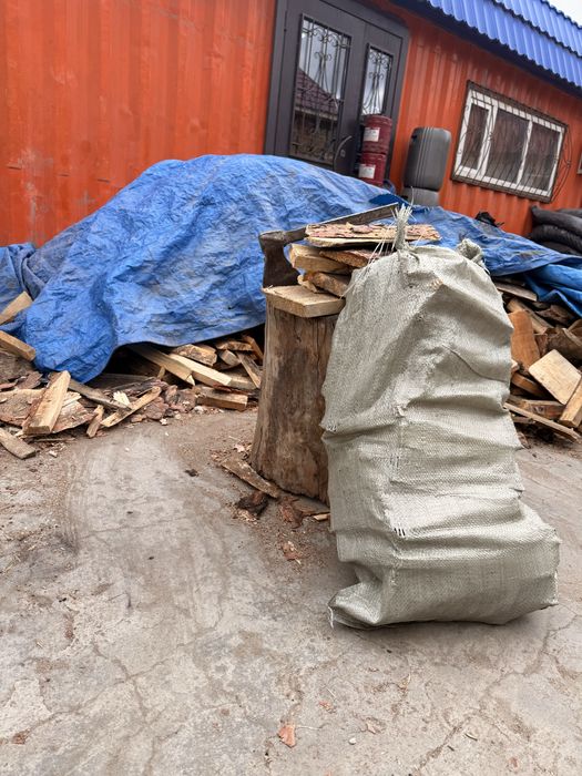 Дрова в мешках 1000 тг