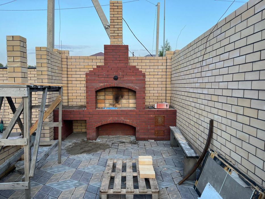 Каменщик, бригада строителей