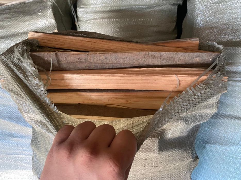 Дрова рубленные в мешках