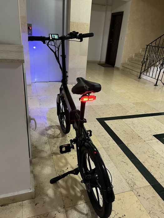 Bicicleta electrica pliabila ,  asistata ADO cu frane hidraulice