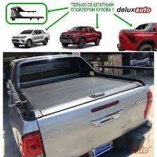 Рол шторка крышка и рам бар на Toyota Hilux