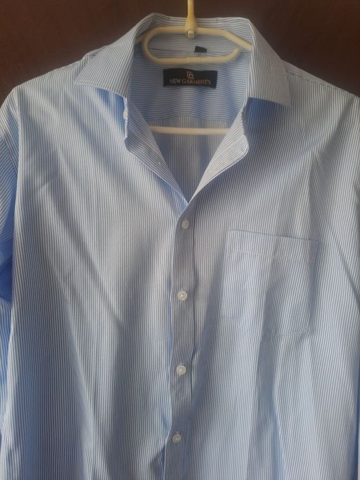 Vînd cămașă modernă;nouă.