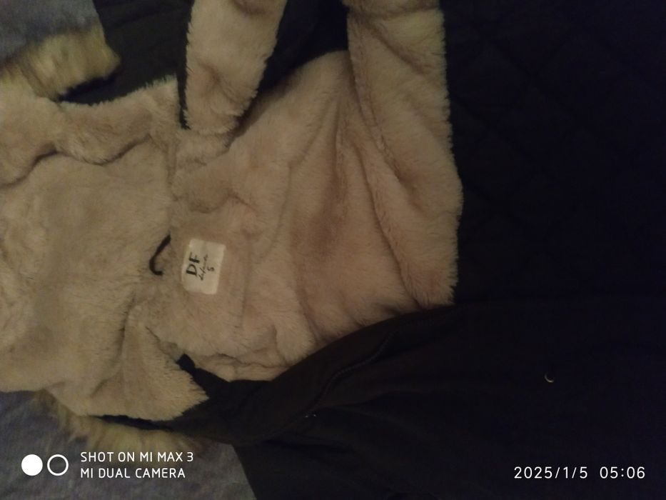 Парка куплена в Defacto