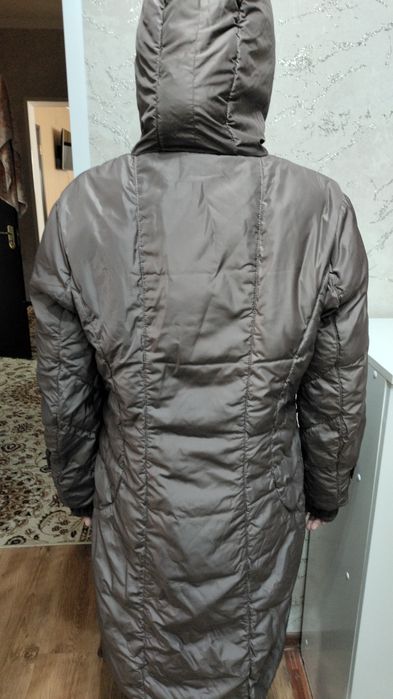 Продам теплый пуховик.