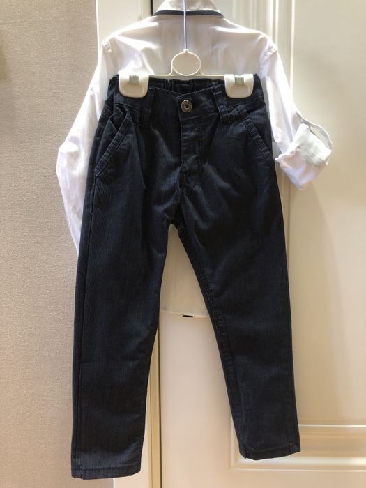 Продам рубашки,брюки и шорты