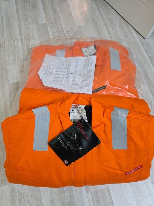 Зимний комбинезон 14000 тг