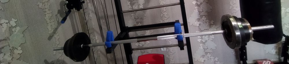 Shtanga ellik kilogramm toshlari bilan