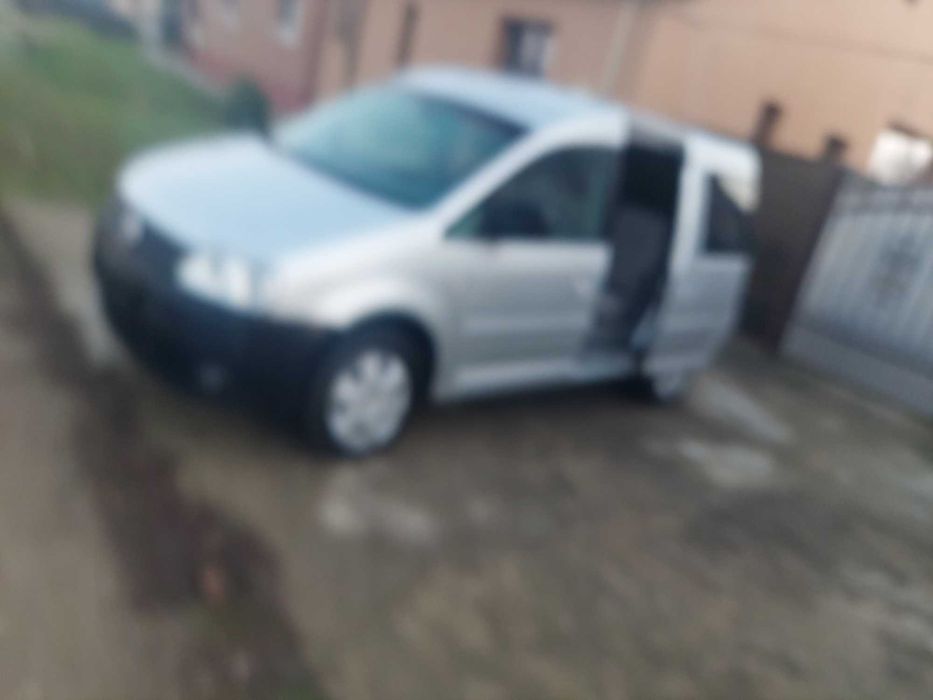 Volskwagen caddy,1.4 benzina,an 2009