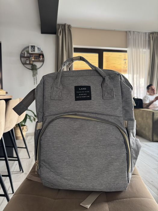 Ghiozdan multifuncțional pentru mămici – cu pătuț extensibil, nou