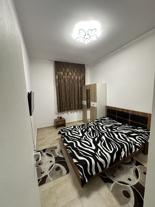 Inchiriez apartament 2 camere situat la demisol inalt