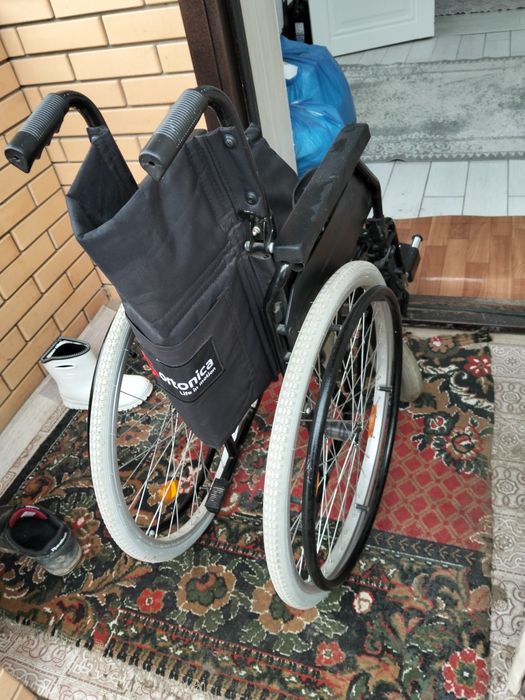 Инвалидный коляска