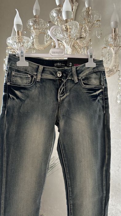 Джинсы новые