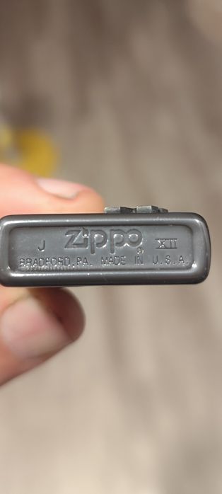 Bricheta și husa Zippo