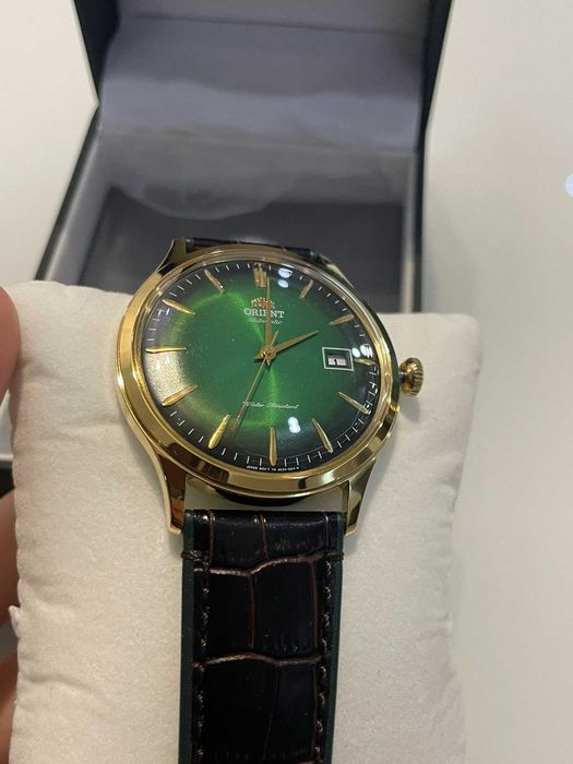 Orient, Автоматичен часовник с овален корпус