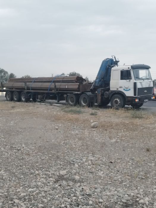 Длинномер манипулятор. Контейнеровоз