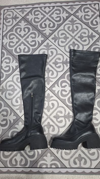 Новые ботфорты .  ...