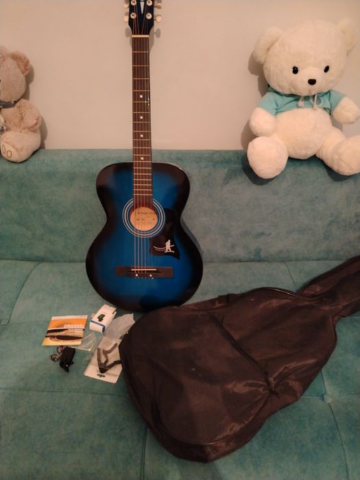 Гитара новая не пользавались