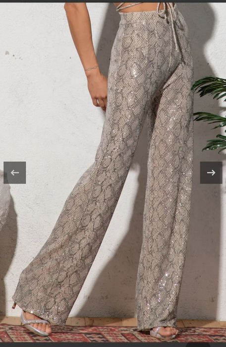 Pantaloni bej cu paiete strălucitoare, model cu pantaloni largi