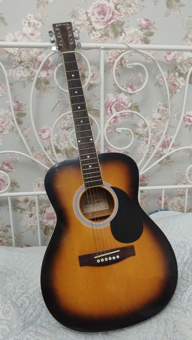 Акустическая гитара