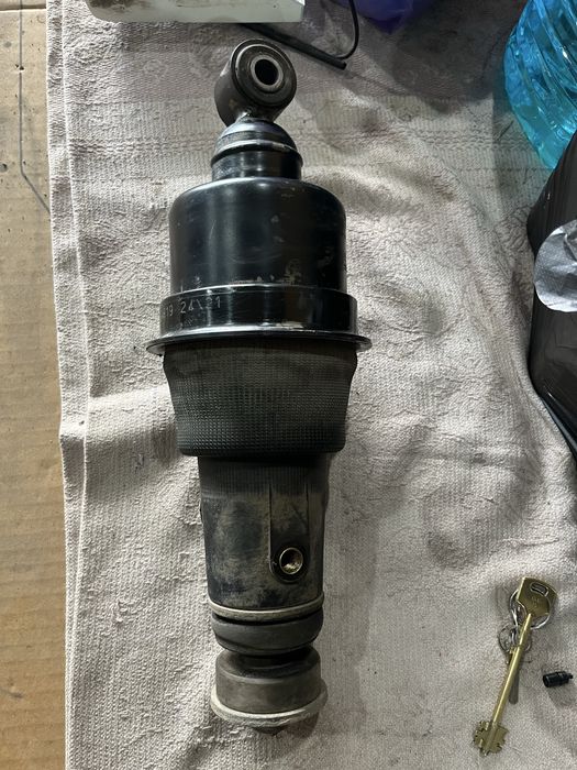 Даф105 амортизатор кабины зад