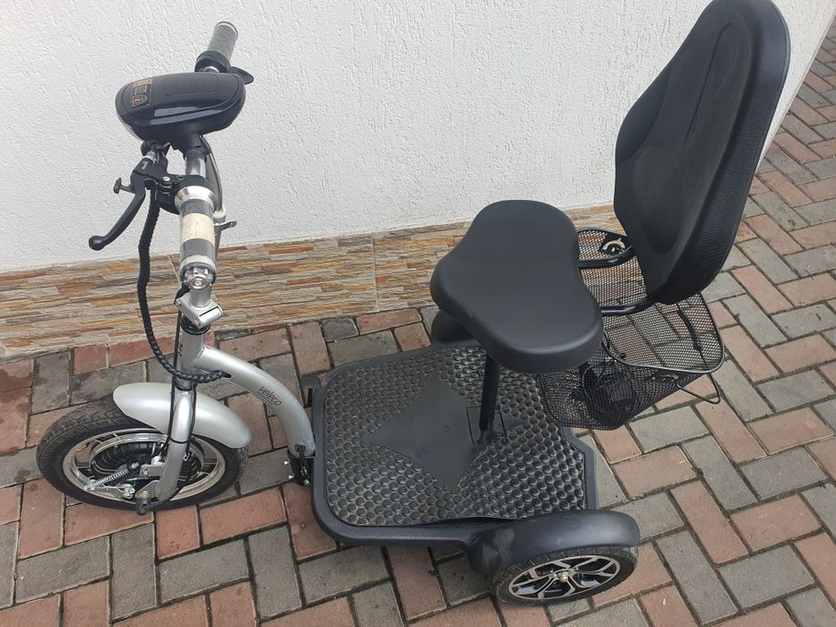 Triciclu electric aproape nou imp germania